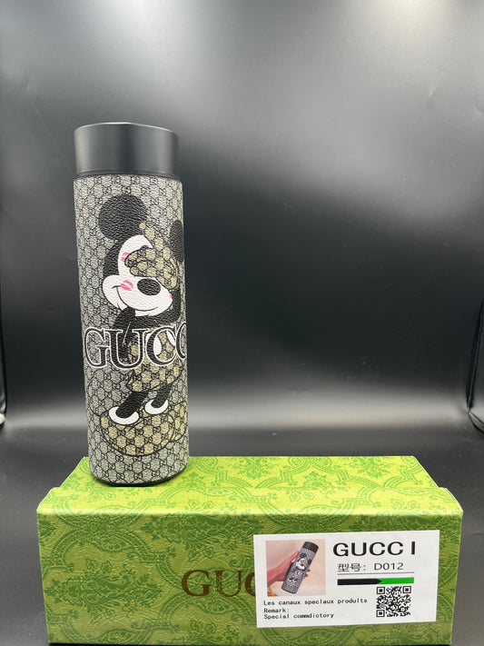 MICKEY MOUSE GUCCI 20 OZ LEATHER WRAPED TUMBLER W DIGITAL READ OUT.